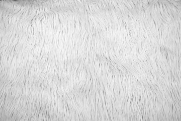Fluffy fur texture for background. Wool-like fiber fabric.