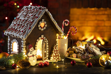 Christmas Eve Party Table. Fireplace and Christmas tree, treats, warmth, cozy family hearth