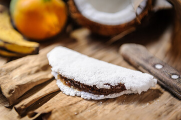 Tapioca with coconut sweet, papaya and banana. Delicacy from the northeast region of Brazil.