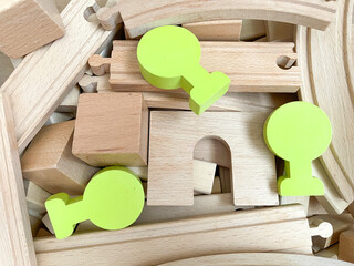 Wooden toys in a box. The concept of childhood and child development. Montessori. Environmentally friendly material. A large number of toys.