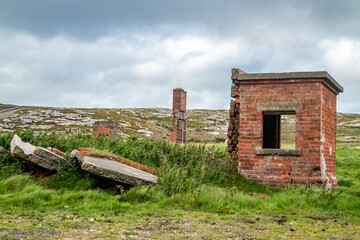 The ruins of Lenan Head fort at the north coast of County Donegal, Ireland.