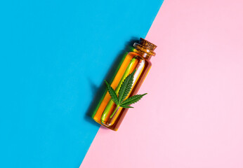 Medical CBD Cannabis oil glass bottle with Marijuana leaf