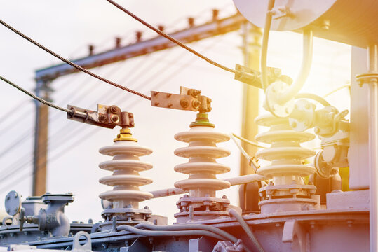 High voltage circuit electric breaker in a power substation.Closeup of high voltage insulators at new substation.Storage outdoors current transformer.