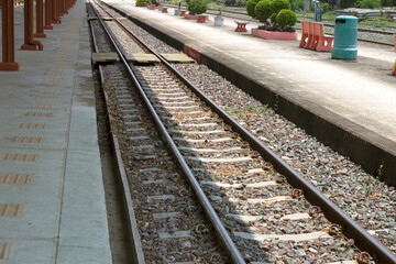 Fototapeta na wymiar Railway tracks at a station in Thailand