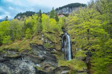 Reichenbach Waterfall. The Reichenbach Falls are a waterfall cascade of seven steps on the stream called Rychenbach in the Bernese Oberland region of Switzerland