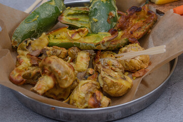 Vegan cauliflower wings and battered airfried vegetables , crudites with assorted crudites and sauces