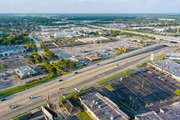 Fototapeta premium Top view over the traffic backed up during rush hour on 45 interstate highway, expressway in Houston city Texas USA