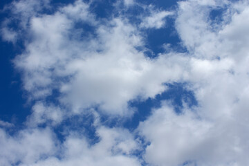 Blue sky background with clouds. sunny autumn day