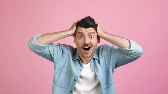 Displeased frustrated loser geek man hands head epic fail reaction