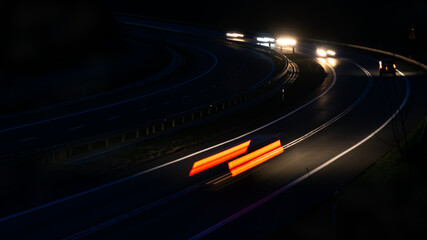 lights of moving cars at night. long exposure