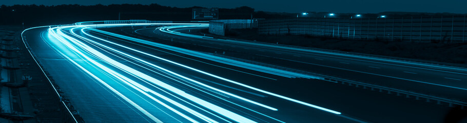 blue car lights at night. long exposure