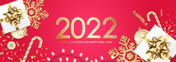 2022 Merry Christmas and Happy New Year banner with gift boxes, golden glitter snowflakes, balls, garland, candys and confetti on red background. Vector ilustration.