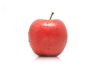 single fresh red apple with water drops isolated on white background