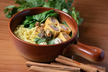 Egg noodles with pork meatballs and vegetables Noodles Thai style