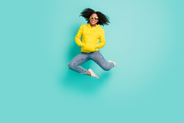Fototapeta na wymiar Full length body size photo woman jumping up wearing casual clothes isolated bright teal color background
