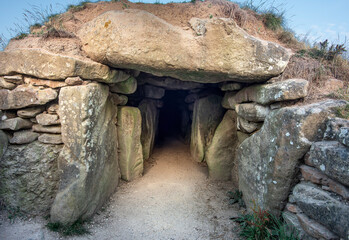 Entrance to burial chambers at sunrise,West Kennet long Barrows,Wiltshire,UK.