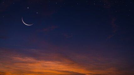 Crescent moon sky on dark blue dusk in the evening with sunset and beautiful sunlight on dark...