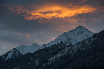 Fototapeta na wymiar Sunset view of the snow-covered Alps in Austria