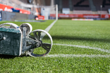 Line painting trolley on a soccer field