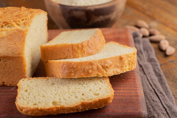 Sliced almond flour,gluten free bread over wooden board
