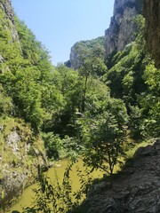 Fototapeta na wymiar Turda gorge Cheile Turzii is a natural reserve on Hășdate River situated near Turda close to Cluj-Napoca, in Transylvania, Romania, Europe