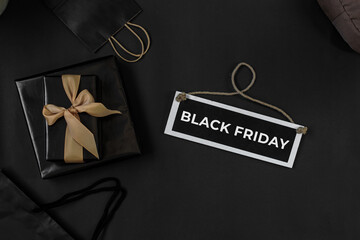 Fototapeta na wymiar Black Friday Sale or online shopping promotion concept with various shopping accessories