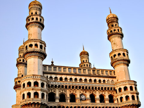 Close up image of Charminar with a clear blue sky background in Hyderabad.