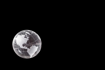 America on a transparent world ball on a black background