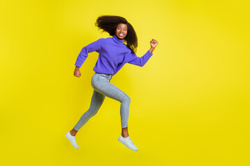 Fototapeta na wymiar Full length profile photo of running cheerful dark ksin lady look have good mood isolated on yellow color background