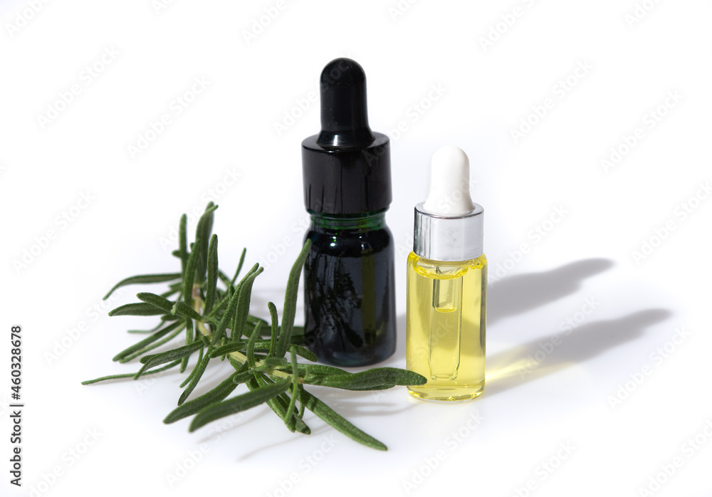 Canvas Prints Bottle of essential oil with fresh rosemary twigs on white background