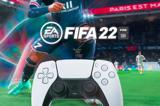 Playstation 5 Dual Sense Controller with FIFA 22 game blurred in the background. Rio de Janeiro, RJ, Brazil. October 2021.