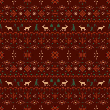 Fototapeta Vector classic christmas seamless pattern with stylized reindeers, spruces and snowflakes. Red and green ornate geometric background in scandinavian style for fabric, wrapping paper and packaging 
