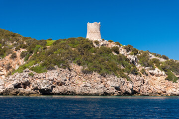 Fototapeta na wymiar Old defensive tower (Torre del Bollo) along the coastline near Alghero (Sardinia, Italy)