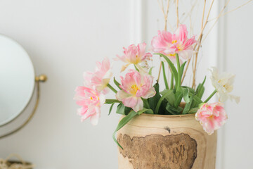 Fresh pink flowers in a bright room