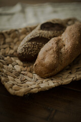 Baguette of dark and light bread close-up)