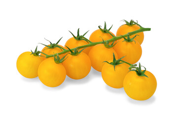 a sprig of fresh yellow cherry tomatoes and two cherry tomatoes lying next to each other on a white isolated background.