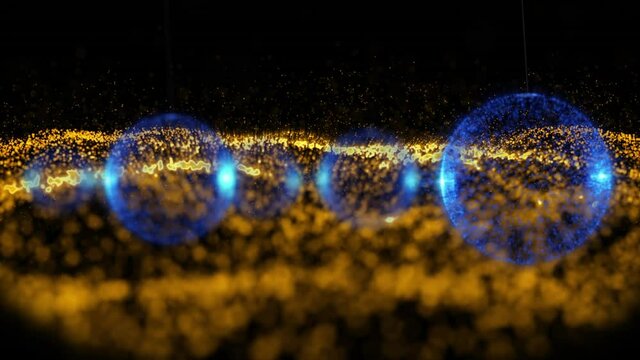 Animation of blue baubles over moving gold wave of dots
