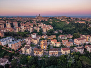 Fototapeta premium Siena panorama aerial drone Italia sunset red