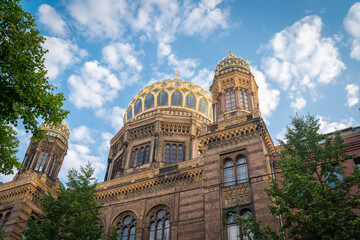 Ornate gold and green domes and turrets of Jewish synagogue