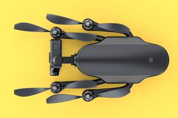 Flying photo and video drone or quad copter with action camera on yellow
