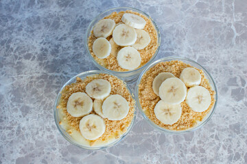 Magnolia banana dessert on the marble table. Closeup photo of delicious magnolia dessert.