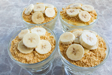 Magnolia banana dessert on the marble table. Closeup photo of delicious magnolia dessert.