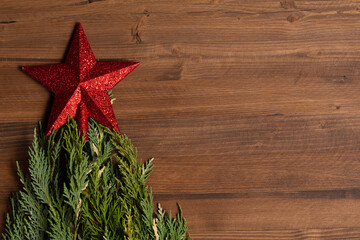 Christmas background. with christmas tree on wooden background. Christmas card. Top View. copy...