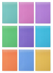 Set with different multicolored planners on white background, top view