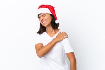 Young mixed race woman celebrating Christmas isolated on white background suffering from pain in shoulder for having made an effort