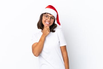 Young mixed race woman celebrating Christmas isolated on white background with glasses and smiling
