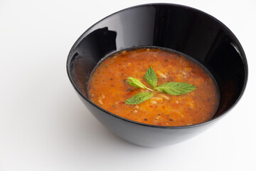 bowl of soup on white background