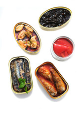 Variety of cans of preserves