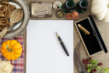 paper, pen, retro accessories on table
