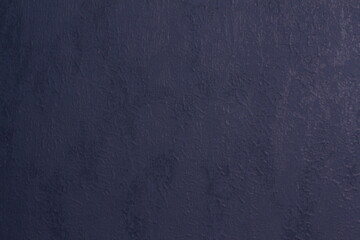 A dark blue wallpaper texture